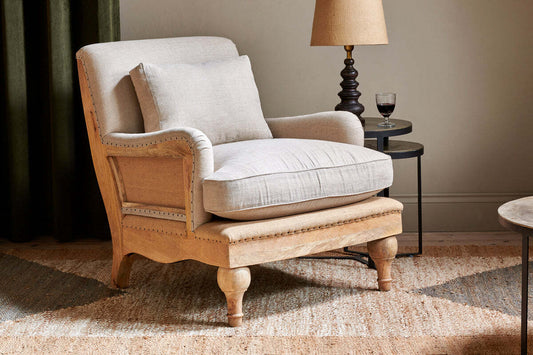 Lush & More Abe deconstructed linen armchair in stone color with a modern, minimalist design and plush seating.