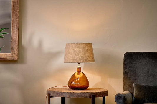 Small wide Baba recycled glass lamp base in burnt amber by Lush & More, showcasing a smooth, rounded table lamp design.