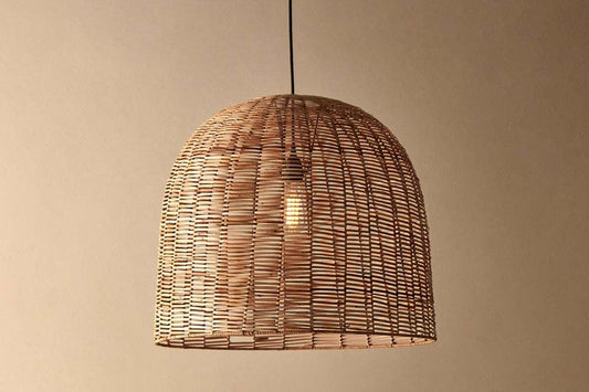 Large Noko wicker dome pendant light by Nkuku featuring natural woven wicker material and a rounded, dome-shaped design.