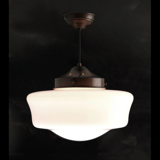 Small antique bronze school pendant light by Kansa, featuring vintage-inspired gallery design and detailed metalwork.